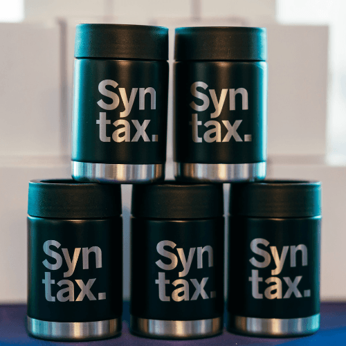 Six canisters with the words syntax printed on them